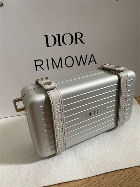 dior x rinowa|Dior x Rimowa clutch.